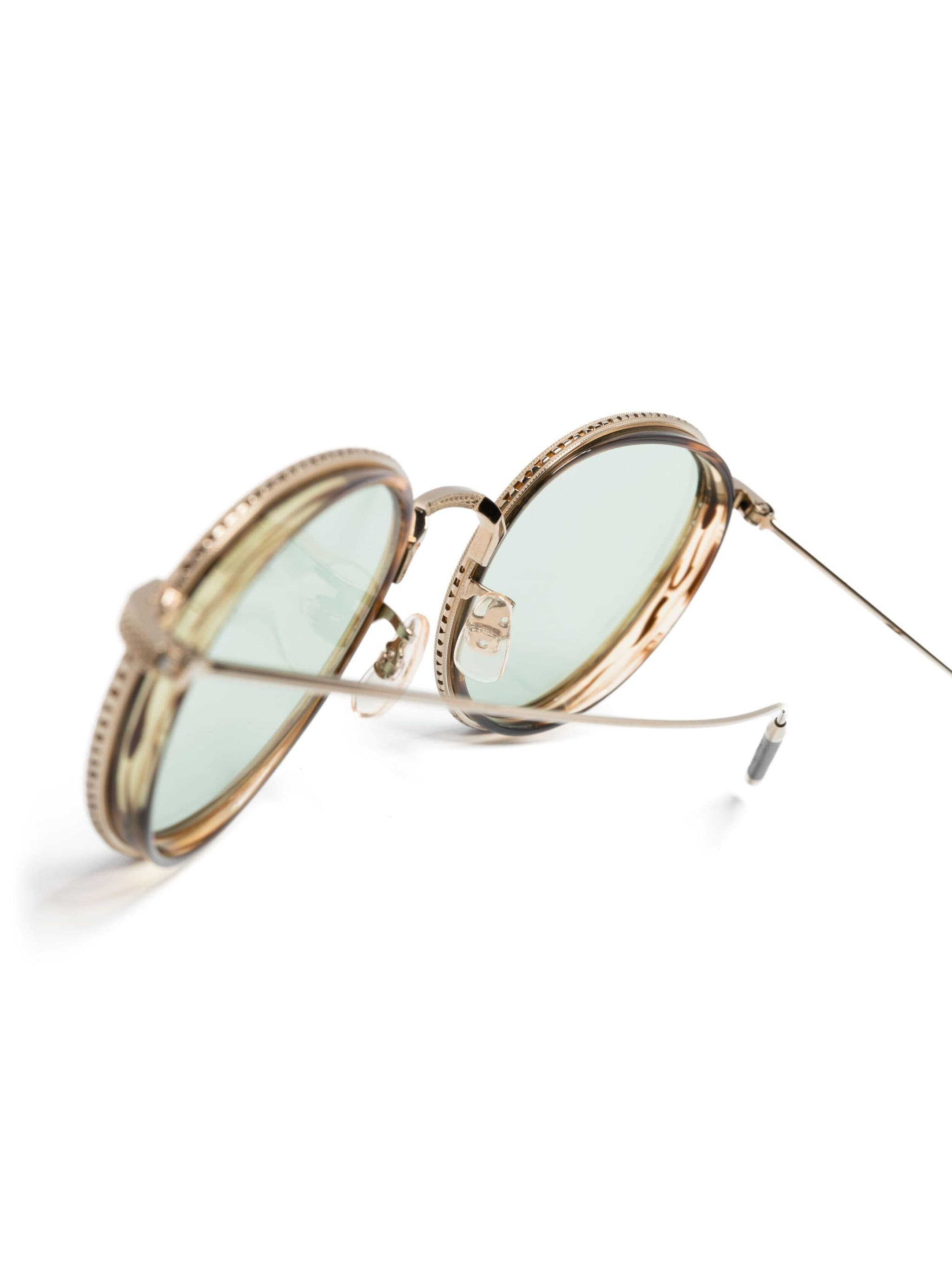 Oliver Peoples Oliver Peoples солнцезащитные очки TK-8 в круглой оправе — Фото 1